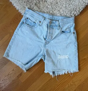 Levi's 501 Light Blue Denim Cutoff Shorts - Women's thumbnail 1