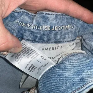 American Eagle curvy hi-rise distressed jeggings thumbnail 2