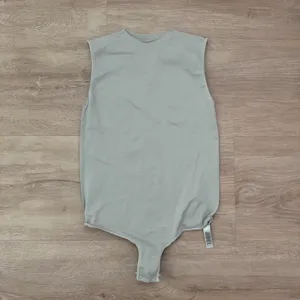 Skims Essential Bodysuit in Mineral Green thumbnail 2
