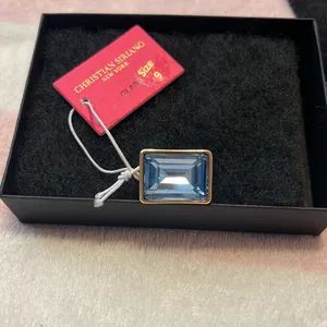 Beautiful Christian Siriano 14 karat gold plated, blue glass, stone ring thumbnail 3