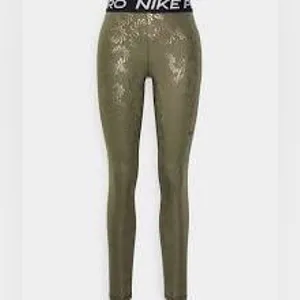 Nike Pro Dri-FIT Women s Mid-Rise Leggings thumbnail 2