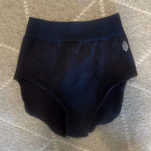 Free People Happiness Runs Brief Shorts in Washed Out Black thumbnail 1