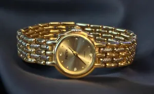 Gold tone basketweave band ladies watch thumbnail 1
