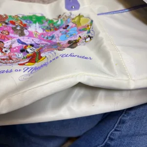 Disney 100 yrs of Music & Wonder tote bag. cream, shimmer purple. Never used thumbnail 9