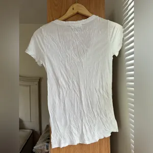 Urban Outfitters White V-Neck Tee with Crisscross Detail thumbnail 2