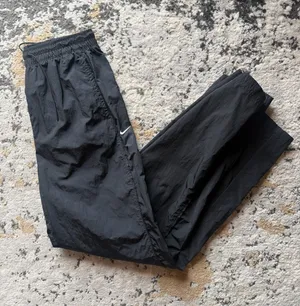 Nike Black Lightweight Track Pants with White Swoosh thumbnail 1