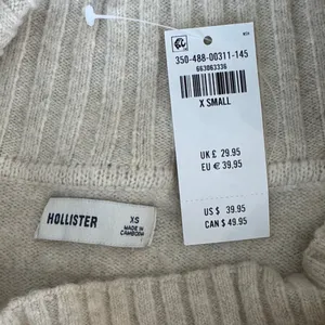 Hollister Off-Shoulder Sweater in Cream thumbnail 2