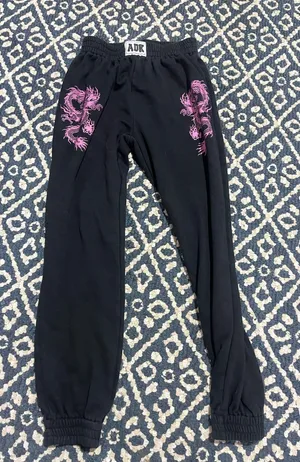 Adika black joggers with pink dragon detail womens s thumbnail 1