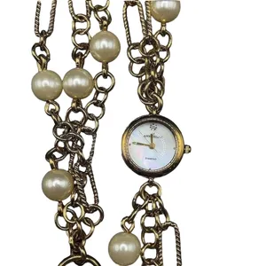 Anne Klein Women's Chunky Bracelet Watch Gold Faux Pearl Wrap Bracelet thumbnail 5