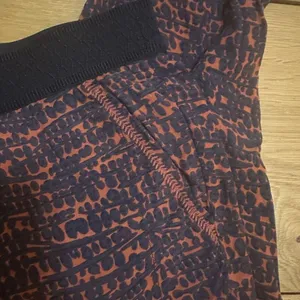 Anthropologie Hei Hei kiri kiti pants orange black medium pull on thumbnail 6