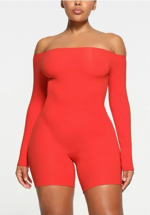 SKIMS Off-Shoulder Long Sleeve Bodysuit Romper in Ruby thumbnail 1