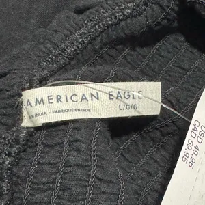 American Eagle Black Smocked Mini Dress Ruffle Hem Sleeveless Size Large thumbnail 5
