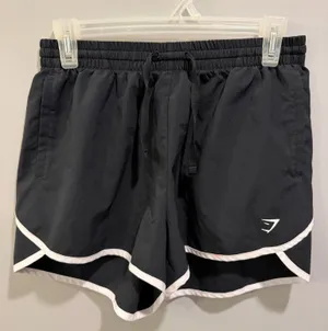 Gymshark Training Contrast Loose Shorts 2.5” Inseam Training Shorts Black and White thumbnail 1