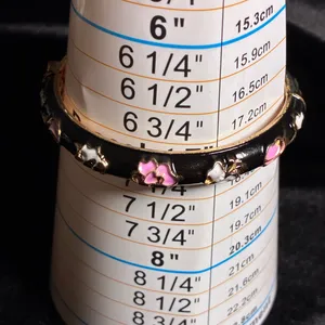 New Black enamel floral bangle bracelet with gold tone accents jewelry 7” thumbnail 4