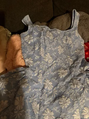 Light blue ladies dress with an all-over white floral print. Fit-and-flare silhouette with wide shoulder straps for comfortable wear. Soft woven fabric offers gentle structure and twirl-ready skirt. Perfect for parties and special occasions. thumbnail 2