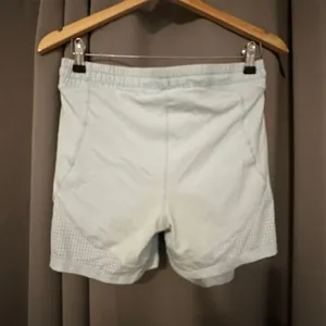 Fabletics‎ Perforated Run 2" Short Light blue with pocket thumbnail 2