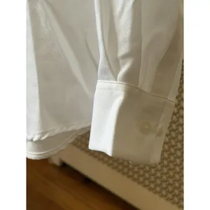 UNIQLO Women's L White Solid Collared Long Sleeve Button Women's Rayon Blouse thumbnail 6
