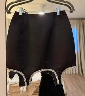 Black satin mini skirt with rhinestone trim size XS thumbnail 1