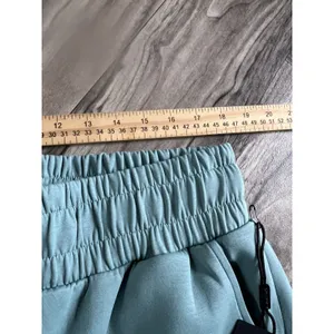 Set 2 Pcs Alphalete Women's ELMTS Short Sleeve Crop & Relaxed Coffed Jogger Teal thumbnail 9