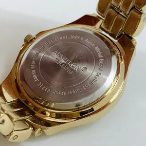 Armitron 27mm ladies Quartz analog WR watch gold tone MOP dial 6.5”-7” thumbnail 6