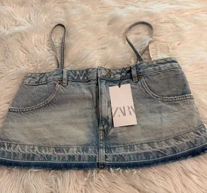 ZARA Light Blue Denim Mini Shirt with Straps size S brand new length 10” thumbnail 1
