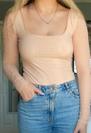 Forever 21 pink polka dot long sleeve bodysuit. Size L thumbnail 1