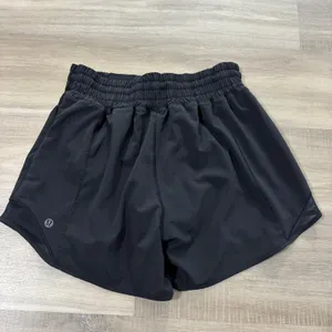 Lululemon Hotty Hot Short High-Rise Long 4" Women Size 4 Black thumbnail 3