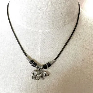 Silver tone bear pendant necklace on black cord thumbnail 4