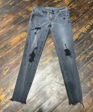 American Eagle distressed super low rise size 0 jeggings thumbnail 1