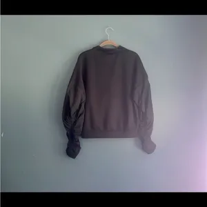 Reebok black zip up‎ sweatshirt with windbreaker ruffle sleeves women size small thumbnail 2