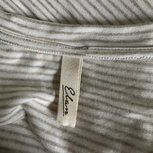 Elan Cream Striped V Neck Short Sleeve Tee Double Layer Soft Asymmetrical Top thumbnail 6