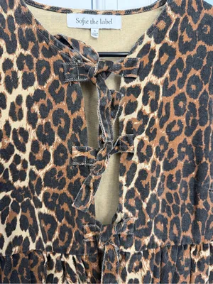 Leopard-Print Tie-Front Peplum Blouse in Tan & Black thumbnail 5