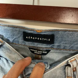 Aeropostale Vintage High‎ Rise Shorty Distressed Denim Shorts Light Wash Size 0 thumbnail 3