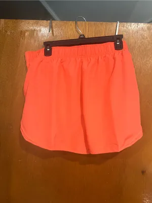 Nike Women's Coral Athletic Shorts with White Swoosh thumbnail 4