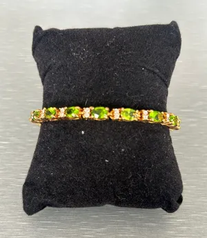 Avon Vintage light green gemstone and clear crystal tennis bracelet thumbnail 1