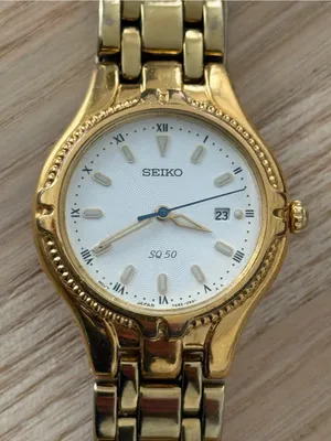 Seiko Vintage Watch Gold Bracelet Case White Dial Blue Gold Hands Date Window thumbnail 7
