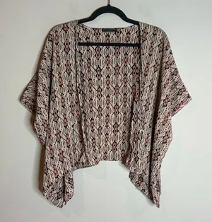 🔆 Brandy Melville patterned open shrug cardigan thumbnail 1