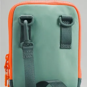 Lululemon easy access crossbody orange green bag travel casual bag thumbnail 3
