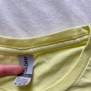 pastel yellow and blue Notre Dame knitting club shirt thumbnail 4
