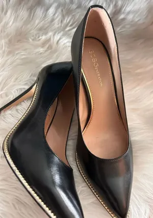 BCBG generation high heels black with gold accent around size 7B thumbnail 1
