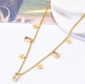 Dainty Clovers & CZ Charms Gold Necklace thumbnail 5