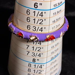 Purple and gold enamel bangle bracelet with red and white flower designs 7” thumbnail 4
