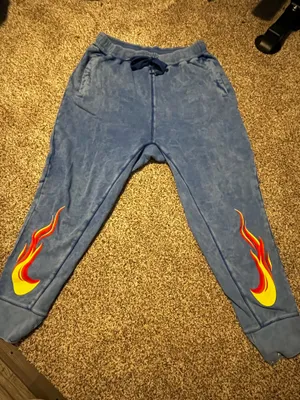 Nike Sportswear French Terry Flames sweatpants in a Game Royal blue colorway. thumbnail 2