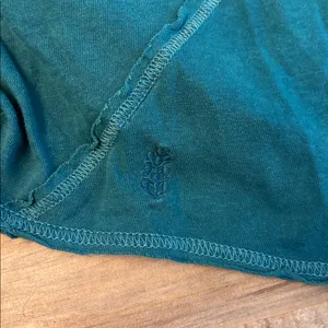 Teal long-sleeve crop top with a front twist detail. thumbnail 4