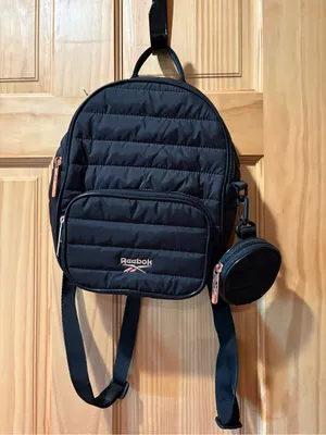 Reebok Women's Luna Quilted Mini Backpack with a detachable coin pouch in black thumbnail 1