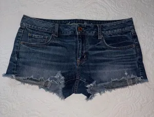 American Eagle Y2K Cut-Off Jean Shorts. Size: 12. Medium Wash. thumbnail 1
