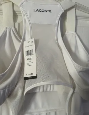 Lacoste Sport racerback tennis dress with a pleated hem is a size 10. thumbnail 4