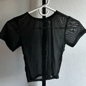 See through black shirt thumbnail 1