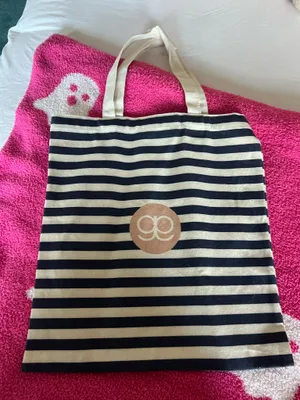 Stylish Gorjana tote bag featuring navy and cream stripes. Perfect for everyday use. thumbnail 2