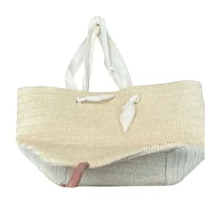Dezine news inc NWOT straw tote bag with fabric handles 1 small spot on 1 handle thumbnail 1
